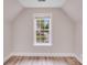 Bedroom with a view of the neighborhood through a window at 1000 Potters Bluff Rd, Monroe, NC 28110