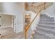Grand foyer with soaring ceilings, elegant staircase, and beautiful flooring creating an inviting entrance at 1000 Potters Bluff Rd, Monroe, NC 28110