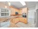 Stylish kitchen featuring granite counters, stainless steel appliances and custom cabinets at 1000 Potters Bluff Rd, Monroe, NC 28110