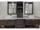 Bathroom with dual sinks, dark wood cabinetry, and marble countertops at 1012 Harper Lee Dr, Newton, NC 28658