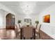 Formal dining room with elegant chandelier, wainscoting and views of front entryway at 1012 Harper Lee Dr, Newton, NC 28658