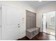 Mud room with a built in bench with hooks at 1012 Harper Lee Dr, Newton, NC 28658