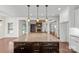 Open kitchen design with a large island, seamlessly connected to the living area at 1012 Harper Lee Dr, Newton, NC 28658