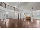 Open-concept living area with high ceilings, a balcony, and a view of the kitchen at 1012 Harper Lee Dr, Newton, NC 28658