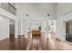 Open-concept living area featuring white columns and a seamless transition to the kitchen at 1012 Harper Lee Dr, Newton, NC 28658