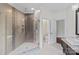 Custom shower in the bathroom with a glass enclosure and decorative tile at 1012 Harper Lee Dr, Newton, NC 28658