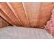 An attic space featuring insulation, exposed rafters and flooring at 10432 Camelback Cir, Charlotte, NC 28226