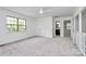 The upstairs bedroom is spacious with carpet, a ceiling fan and connects to a bathroom at 10432 Camelback Cir, Charlotte, NC 28226