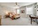 This bedroom features a wooden bed frame, floral wallpaper, and a ceiling fan at 1079 Sage Pine Cir, Clover, SC 29710