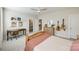 Bright bedroom with guitars, a light wood dresser, and a desk with an office chair at 1079 Sage Pine Cir, Clover, SC 29710