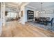 This bright interior boasts hardwood floors, coffered ceilings, and is connected to the dining room at 1079 Sage Pine Cir, Clover, SC 29710