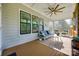 Inviting porch featuring comfortable seating, ceiling fan, and a relaxing outdoor atmosphere at 1079 Sage Pine Cir, Clover, SC 29710