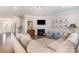 Cozy living room with a fireplace, built-ins, and a comfortable sectional sofa, ideal for relaxing at 11234 Smokethorn Nw Dr, Concord, NC 28027