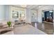 Comfortable living room with hardwood floors, lots of light, and stylish furniture at 11234 Smokethorn Nw Dr, Concord, NC 28027