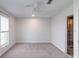 Bedroom showcasing a carpet floor, ceiling fan, and an en-suite bathroom at 12036 Duke Lancaster Dr, Charlotte, NC 28277