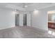 Bedroom with a ceiling fan, carpet floors, closet, and en-suite bathroom at 12036 Duke Lancaster Dr, Charlotte, NC 28277