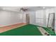 A large bonus room with a ceiling fan, with mixed flooring, and fitness mirror at 12036 Duke Lancaster Dr, Charlotte, NC 28277