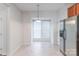 Bright, window-filled dining nook with views and stainless steel refrigerator at 12036 Duke Lancaster Dr, Charlotte, NC 28277