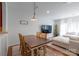 Open dining area that features a large table with seating and view to the living room at 12036 Duke Lancaster Dr, Charlotte, NC 28277