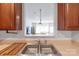 Kitchen sink with a view of the living room and an open-concept design at 12036 Duke Lancaster Dr, Charlotte, NC 28277