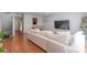 A spacious living room with a large sectional, TV, and an open dining area at 12036 Duke Lancaster Dr, Charlotte, NC 28277