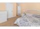 Comfortable bedroom with neutral carpet, a full bed, and a door to the hallway at 1219 Century Dr, Clover, SC 29710