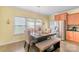 Bright dining room featuring a rustic table with chairs and bench seating at 1219 Century Dr, Clover, SC 29710