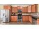 Well-equipped kitchen with stainless steel appliances and granite countertops at 1219 Century Dr, Clover, SC 29710