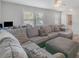 Comfortable living room with plush sectional and lots of natural light at 1219 Century Dr, Clover, SC 29710