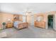 Spacious bedroom with walk-in closet, wood furniture, and neutral carpet at 1219 Century Dr, Clover, SC 29710