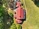 A high aerial view of an estate with manicured lawns and gardens, showcasing the property's layout at 1233 General Hoke Dr, Lincolnton, NC 28092