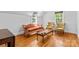 Bright living room with hardwood floors, ample sunlight, and comfortable seating at 1233 General Hoke Dr, Lincolnton, NC 28092