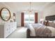 Bright and airy bedroom with large windows, stylish furnishings, and modern lighting at 124 Fordham Ct # 19, Fort Mill, SC 29715