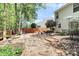 Stone pathway leading to a fenced backyard with mature trees at 1432 Deer Forest Dr, Fort Mill, SC 29707