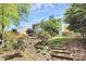 Backyard landscape with stone path and exterior view of house at 1432 Deer Forest Dr, Fort Mill, SC 29707