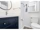 Half bathroom featuring vessel sink, blue vanity and framed mirror at 1432 Deer Forest Dr, Fort Mill, SC 29707