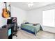 Bedroom featuring a desk, guitar decor, and a comfortable bed at 1432 Deer Forest Dr, Fort Mill, SC 29707