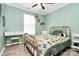 Cozy bedroom featuring a bronze bed frame, desk, and a window for natural light at 1432 Deer Forest Dr, Fort Mill, SC 29707