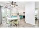 Eat-in kitchen features a round table, white chairs, and a view to the outdoor patio at 1432 Deer Forest Dr, Fort Mill, SC 29707