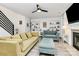 Bright living room featuring modern furniture, a fireplace, and built-in shelving in a modern aesthetic at 1432 Deer Forest Dr, Fort Mill, SC 29707