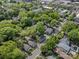 Aerial view of a tree-lined neighborhood with well-maintained streets and sidewalks at 1514 S Rensselaer Pl, Charlotte, NC 28203