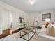 Cozy living room featuring hardwood floors, neutral tones, and modern décor at 1514 S Rensselaer Pl, Charlotte, NC 28203