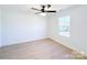 Bedroom with a ceiling fan and hardwood floors has a window and white walls with a white trim at 1525 Solitude Ct, Kannapolis, NC 28081