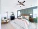 Bedroom with a bed, chair, wood floors, neutral decor, and two windows allowing natural light at 1525 Solitude Ct, Kannapolis, NC 28081