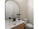 Updated half bathroom with pedestal sink and modern accessories at 15814 Herring Gull Way, Charlotte, NC 28278