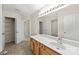 Bathroom featuring double sinks, tile flooring, and a large vanity at 15814 Herring Gull Way, Charlotte, NC 28278