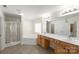 Bright bathroom featuring a shower, tub, double sink vanity, and tile flooring at 15814 Herring Gull Way, Charlotte, NC 28278