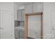 Pantry features built-in cabinets and shelving providing ample storage space at 15910 Parkside Crossing Dr # 318, Charlotte, NC 28278