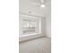 Bright and spacious bedroom featuring a large window with a built-in seat, providing ample natural light at 16631 Commons Creek Dr, Charlotte, NC 28277