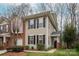 Charming two-story home with black shutters, manicured lawn, and inviting entryway at 16631 Commons Creek Dr, Charlotte, NC 28277